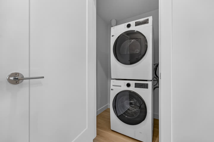In-suite stacked washer and dryer